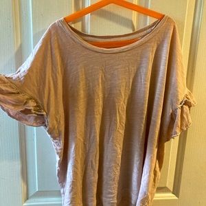 Pinkish shirt with ruffle sleeves